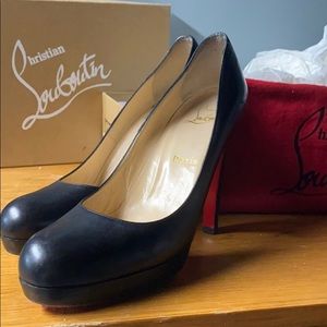Christian Louboutin black pumps
